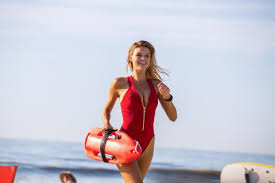 At a los angeles beach, a team of lifeguards led by lieutenant mitch buchannon save lives, deal with personal dramas, fight crime and participate in over the top adventures on a daily basis. Critique Baywatch Alerte A Malibu Le Retour Des Pectoraux Et Des Poitrines Au Cinema Journal Du Geek
