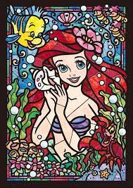It's no secret, we know our valued customers loves everything disney and jigsaws, so it's no surprise that our newest tenyo stained glass jigsaws have been flying off our shelves! Disney Tenyo Puzzle The Little Mermaid Stained Glass Look 266 Pieces Jac S Cave Of Wonders
