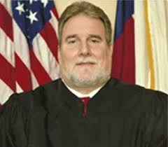 Travis County-based Judge with DWI charge plans to remain in office