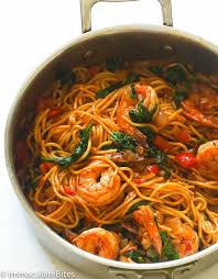 Cook the shrimp, garlic, crushed red pepper, and ¼ teaspoon salt until the shrimp are opaque, 4 to 6 minutes. Spicy Shrimp Tomato Spinach Pasta