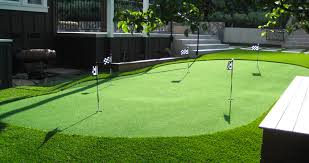 Why go to the club or the driving range to practice your short game, when you can have your own backyard putting green? Improve Your Short Game With A Backyard Putting Green