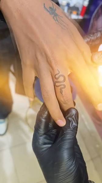 A little snake tattoo on finger 🐍, ., ., ., ., ., @sky_tattoo_studio_amravati , ., . #skytattooamravati #jaistambhchowk #nametattoo #trendingnow #instadaily