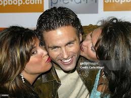 Charlie Maher gets kissed by Bachelor producers Sally Ann Salsano and...  News Photo
