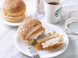 How many calories are in a bacon egg and cheese sandwich from starbucks? Starbucks Singapore Turkey Ham Egg White And Cheddar Sandwich A Fluffy Egg White Patty Served Simply With Turkey Ham And Aged Cheddar Cheese In A Lightly Toasted Wholegrain Bun A Breakfast