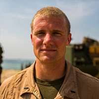 Marine Lt. Col. Lee Hemming speaks during a change