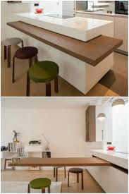 The Dining Table Is Cleverly Hidden In The Countertop Of This Chic Kitchen Living In A Shoebox Kitchen Design Kitchen Interior Dining Table Design