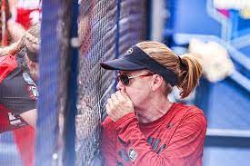 Oklahoma coach patty gasso checks on taylon snow, who had injured her hand at third base garcia, a u.s. Hptyls Cf8exwm