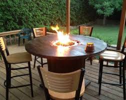 Wood Burning Fire Pit Table Google Search Spool Tables Spool Furniture Wooden Spool Tables