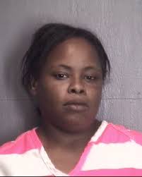 Woman charged in overdose death