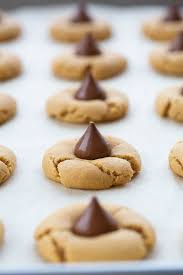 Consequently, he loved this shortbread hershey kiss cookies recipe saying they were delicious before he even swallowed the first bite. Peanut Butter Blossom Hershey Kiss Cookies The Kitchen Magpie
