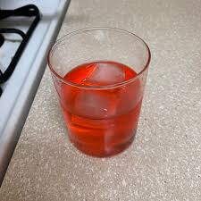 How did the mocktail get its name? Shirley Temple With A Finger Of Coconut Rum And A Lemon Squeeze Aka The Temple Grandin Is Delightful Newgirl