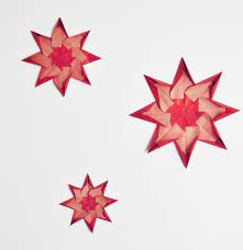 Fabriquer une étoile de Noël en origami - Evolution Classe