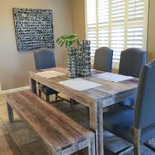 Sophisticated Dining Room With Modern Farmhouse Table And Upholstered Chairs Design By Interior Design Dining Room Dining Room Interiors Modern Farmhouse Table