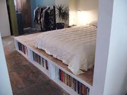 I bought a new latex bed, and seeing as it doesn't need a boxspring, i decided this would be a great opportunity to get some under bed storage without looking at the finished project, next time i would have just stained the inside and left the openings exposed. Look Diy Platform Bed With Storage Diy Platform Bed Platform Bed With Storage Raised Platform Bed