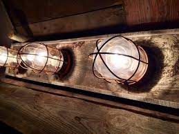 The nauty p nautical pipe fitting caged barn wood vanity bathroom light thewoodsedgeco 5 out of 5 stars (608) $ 245. The Sea Captain Nautical Beach Vanity Light Etsy Beach House Bathroom Nautical Lighting Beach House Decor