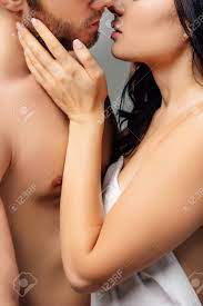 Cropped View Of Naked Couple Hugging And Going To Kiss, Isolated On Grey  Stock Photo, Picture and Royalty Free Image. Image 138728031.