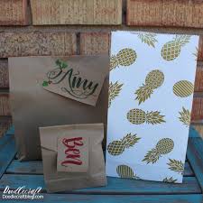 Fold loose sides of paper to cover the sides of the gift; How To Make Gift Bags With Wrapping Paper Diy