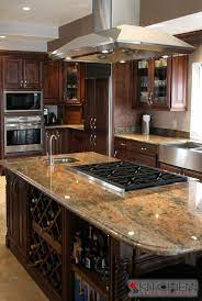 A kitchen island with a sink and a dishwasher generally costs $3,000 to $5,000. Kitchen Photo Gallery Discount Kitchen Cabinets Kitchen Island With Stove Kitchen Island With Cooktop Island With Stove