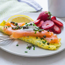 In a small bowl, stir together cream cheese, chives, lemon peel, and lemon juice until smooth. Smoked Salmon Omelette Garlic Zest