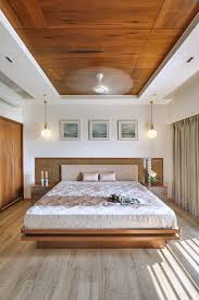 A small modern bedroom with a wicker bed, a floor lamp, catchy printed textiles and a rug plus white curtains. 900 Bed Back Ideas In 2021 Bedroom Design Bedroom Interior Bed Design