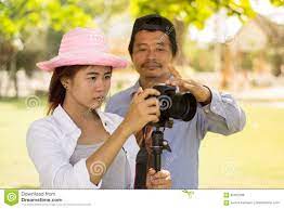 Asian Teen is an Amateur Photographer Practicing Photography. Stock Photo -  Image of setting, photographer: 92302286