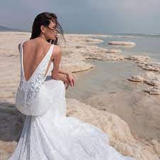 Kleinfeld Bridal On Instagram Shimmering By The Sea What Would You Say To This Pninatorna Wedding Dresses Lace Wedding Dresses Strapless Wedding Dresses