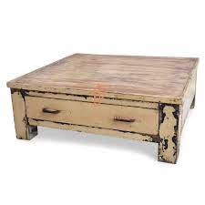 Use a dark stain or wood primer to prime the table. Buy Fr Coffee Tables Series Wooden Low Height Accent Coffee Table With Storage In Beige Distress Painted Finish Online Accent Coffee Tables Hotel And Restaurant Tables Commercial Furniture Furnitureroots Product