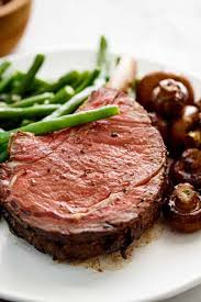 Prime Rib With Garlic Butter Served With Green Beans And Mushrooms Cafedelites Com Rib Recipes Cooking Prime Rib Prime Rib Recipe