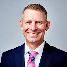 Receiving a coin from the CNO in advance of my retirement.