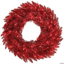 Slim and sleek, this tinsel tree with matching stand is perfect for display in corners or areas with limited floor space. Vickerman 24 Tinsel Red Fir Christmas Wreath With Red Led Lights
