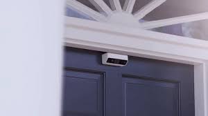 this battery powered security camera fits on your front door home security tips security cameras for home home security