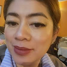 Who is a good hair and makeup artist in Cochrane, Alberta?