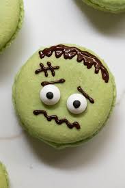 How To Make Frankenstein Macarons Sugar And Charm Recipe In 2020 Halloween Cookies Decorated Halloween Sugar Cookies Halloween Sugar Cookies Decorated