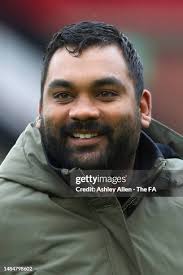 Emily Scarr and Tyler Dodds of Sunderland enter the pitch to warm up...  News Photo