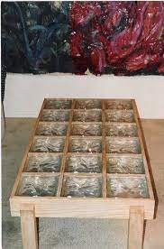 This rustic teak wood table is a remarkable living room centerpiece providing a large surface area for vases and home decor atop its removable protective glass tabletop. Glass Block Coffee Table Glass Block Crafts Glass Blocks Glass Blocks Wall