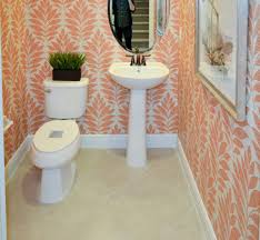 The wood grain tiles only enhancing the organic feel much needed in a bathroom space. Big Tile Or Little Tile How To Design For Small Bathrooms And Living Spaces On Suncoast View Tile Outlets Of America