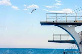 | meaning, pronunciation, translations and examples. White Diving Board Or Tower Against A Clear Blue Sky In The Stock Photo Picture And Royalty Free Image Image 128973317