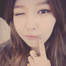 10 years ago.🇰🇭 Kampong Tom, Cambodia 04-10-2014 Four beautiful girls  wearing flowers in their hair and dressed in traditional robes at a  Cambodian wedding.