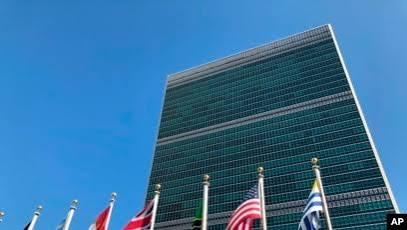 The United Nations flag flying outside their headquarters.
