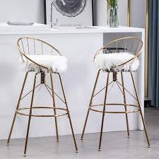 10 best swivel counter stools of may 2021. Awonde 24 Swivel Bar Stools With Back Set Of 2 White Faux Fur Gold Metal Counter Height Chairs Buy Online In Brunei At Brunei Desertcart Com Productid 186966618