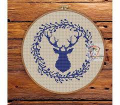 I joined the sides, fringed the edges and attached a ribbon hanger. Free Christmas Cross Stitch Pattern Scandinavian Reindeer Stag