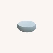 Find a variety of stylish coffee tables that provide chic storage options. West Elm Pebble Outdoor Coffee Table Aptdeco