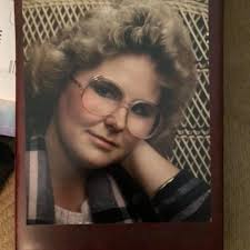 The retired director of the Ripley Public Library, who is personally  responsible for the concrete lions out front and who is the namesake of the  Covington Historical & Genealogical Collection at the