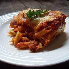Ziti Pasta Is Layered With Provolone Mozzarella Cottage Cheese Sour Cream And A Meaty Sauce With Ground Beef And Sausage Baked Ziti Ziti Pasta Pasta Dishes