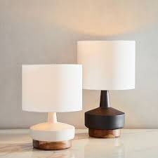 For entryways or formal living rooms, try incorporating less. Wood Ceramic Table Lamp Small