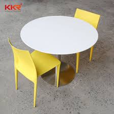 This gathering table features a solid wood tabletop and solid wood base with an antique silver finish to create a faux metal design. China Corian Stone Coffee Tables Acrylic Solid Surface Dining Table Set China Coffee Tables Coffee Table Set