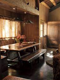 Historically the dining room is furnished with a rather large dining table and several dining chairs. Banquette Seating Meets Picnic Table In Rustic Style Dining Room Hgtv