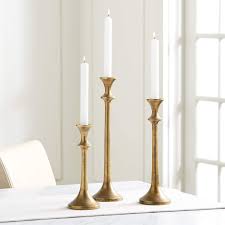 Using these brass candle holders on alibaba.com can provide support to the base of the candles, helping them to stand upright and enhancing their these products will accumulate the wax and stop it from spilling over onto any other furniture. Emmett Antique Brass Taper Candle Holders Crate And Barrel