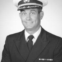 Captain Robert H. Beyer, USN (covered)