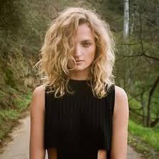 To add curls, hair is wrapped around rods. Wavy Loose Spiral Perm Wavy Haircuts Medium Hair Styles Medium Length Hair Styles